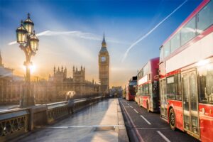 Red buses in a line Westminster bridge