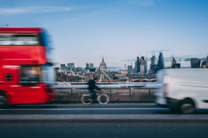 Cyclist red bus London