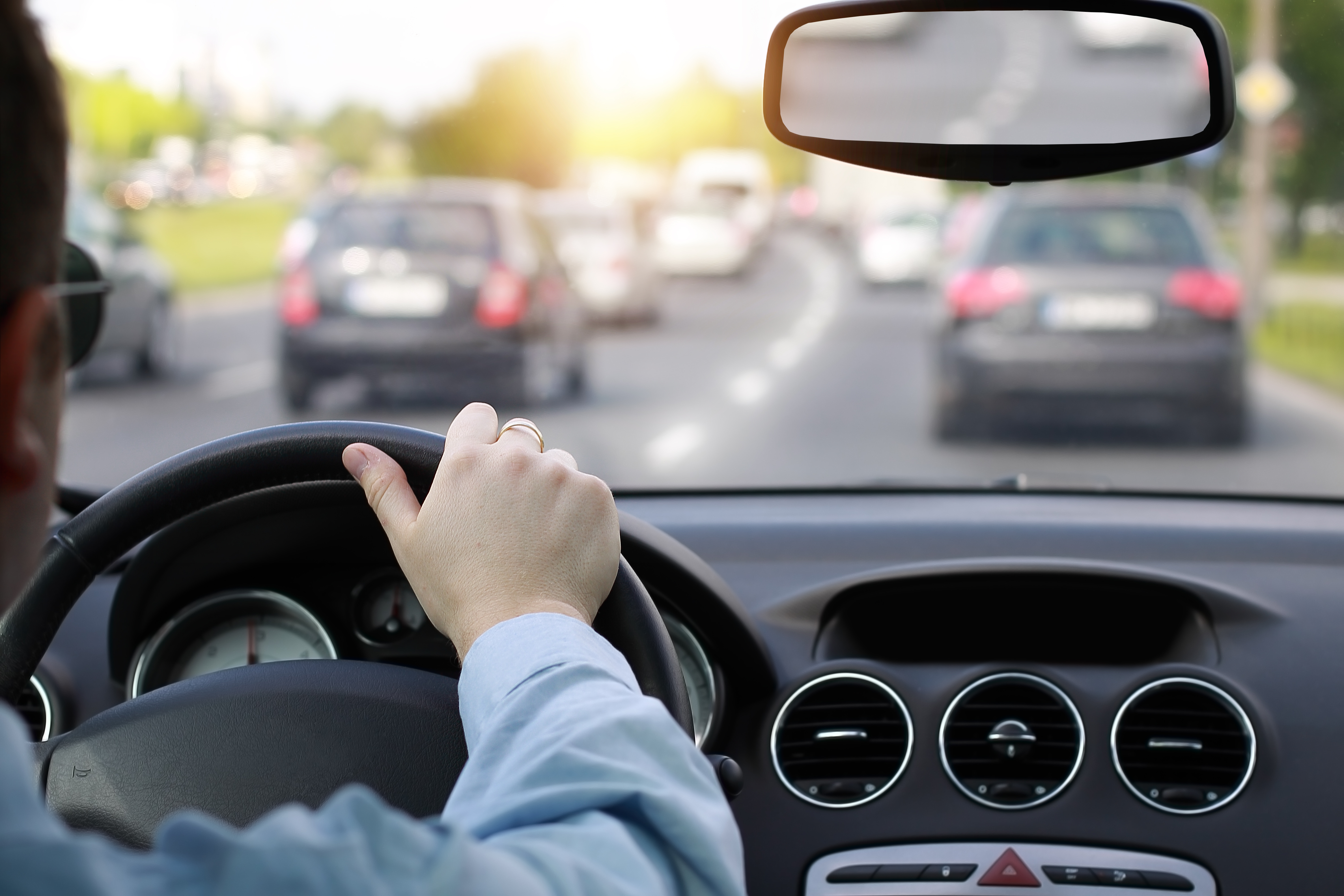 Driver behind the wheel of a car – symbolic of car accident claims.
