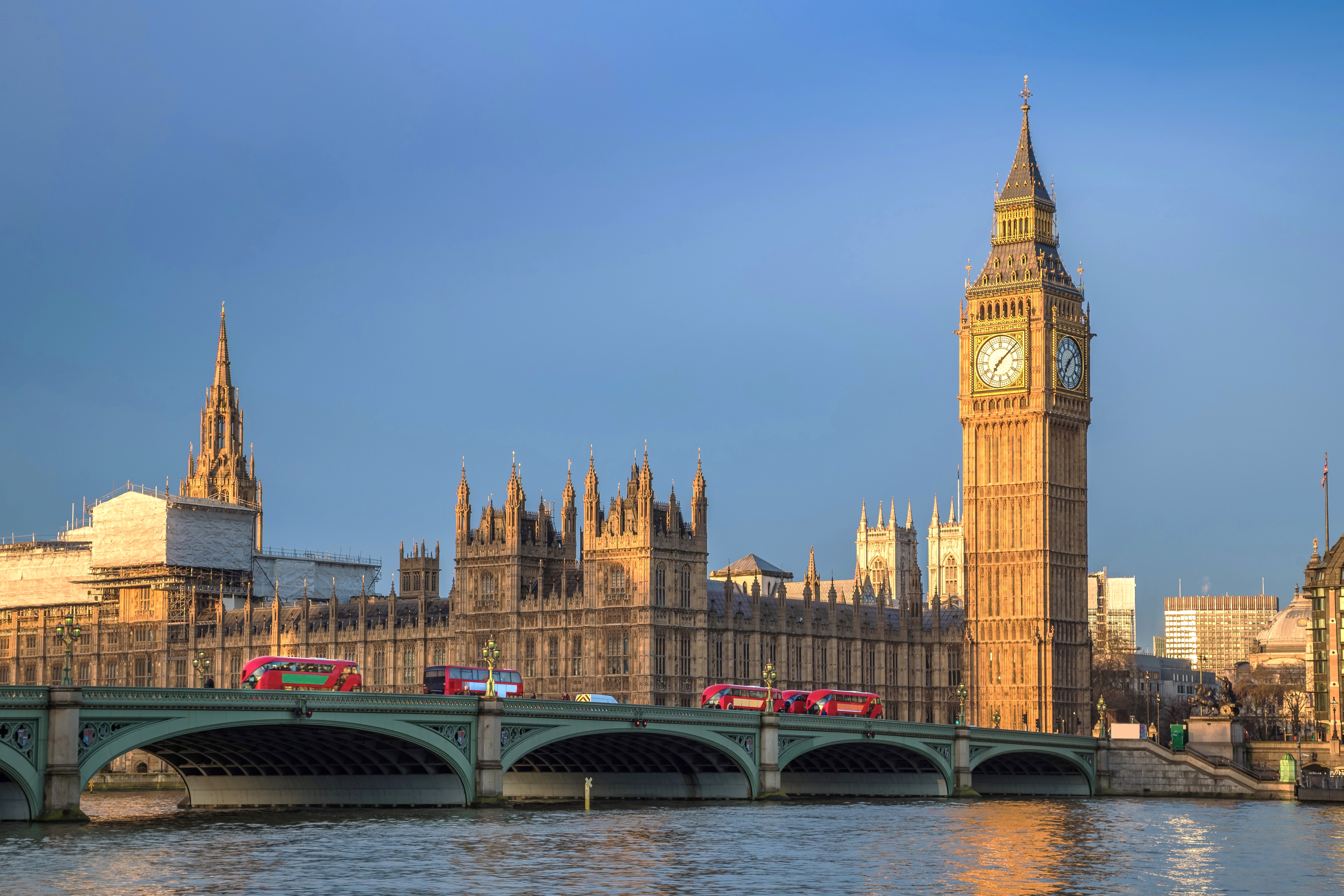 Houses of Parliament at dusk under a blue sky, symbolising upcoming legislative changes to Business Property Relief and Agricultural Property Relief.