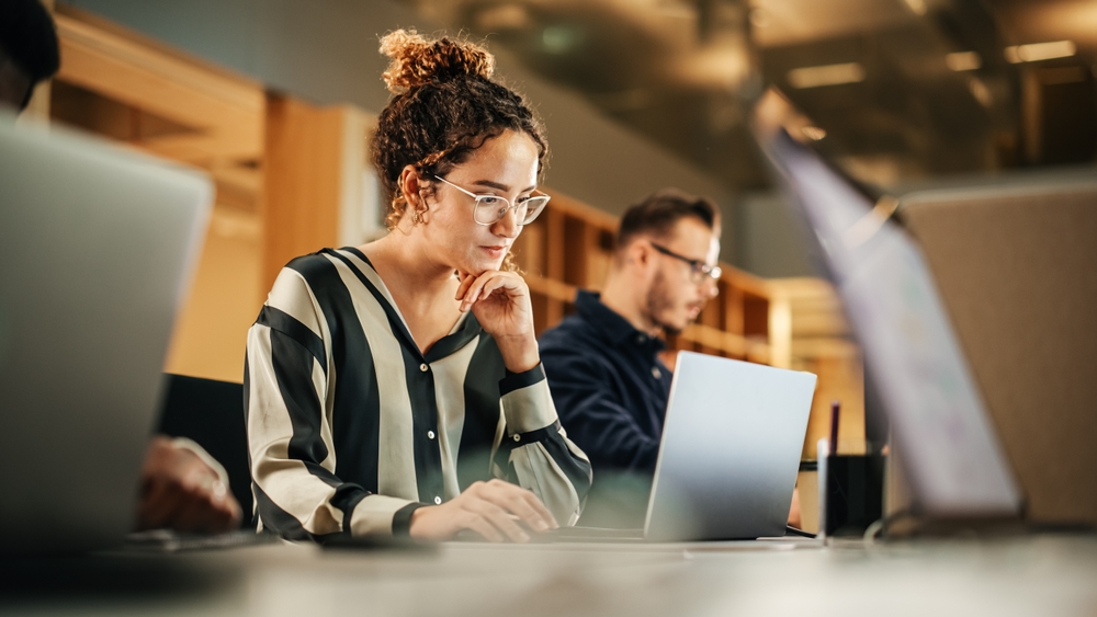Woman working on a laptop employment law updates