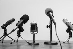 Multiple microphones representing public consultation on trade union workplace access.