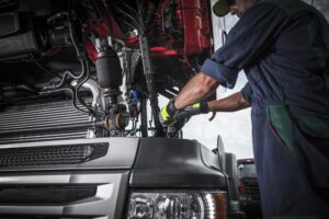 HGV undergoing MOT inspection at an authorised testing facility in the UK