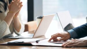 Employer and employee discussing a workplace disciplinary matter.